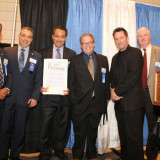 Maqsood Malik, P.E., President of M&J accepts a Proclamation from the Mayors Office at the NY Build EXPO